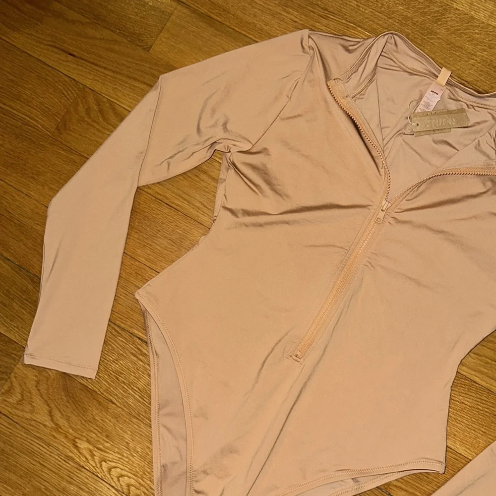 SKIMS SWIM ZIP FRONT LONG SLEEVE ONE PIECE in Ochre NEW